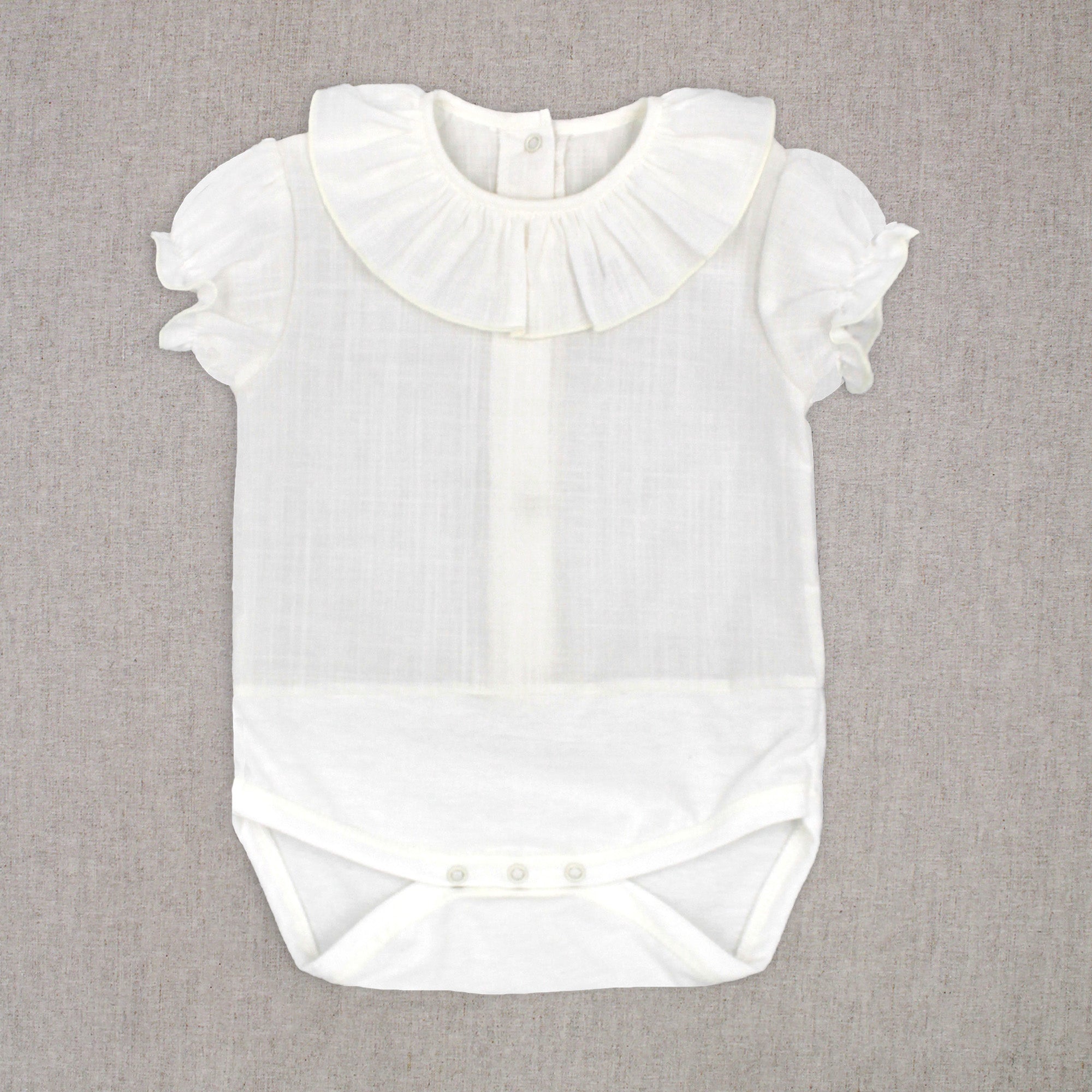 Body con cuello volante