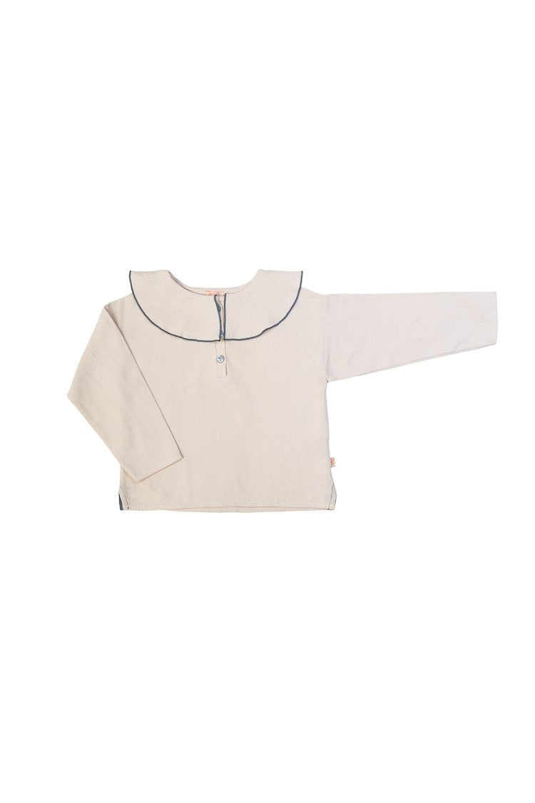 Blusa cuello volante